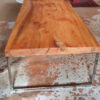 long cedar coffee table on cow hide