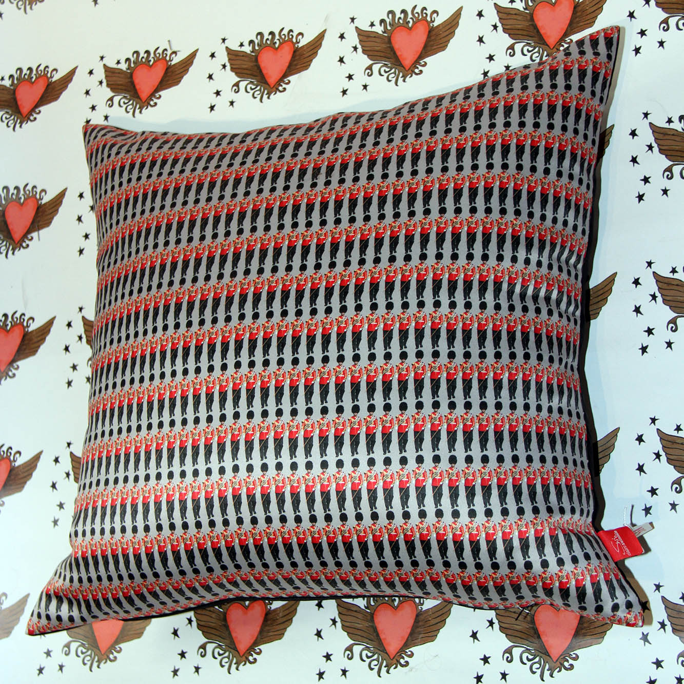 soldier design on cushion, background hearts
