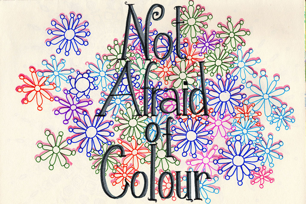 not afraid of colour logo on busy arty background